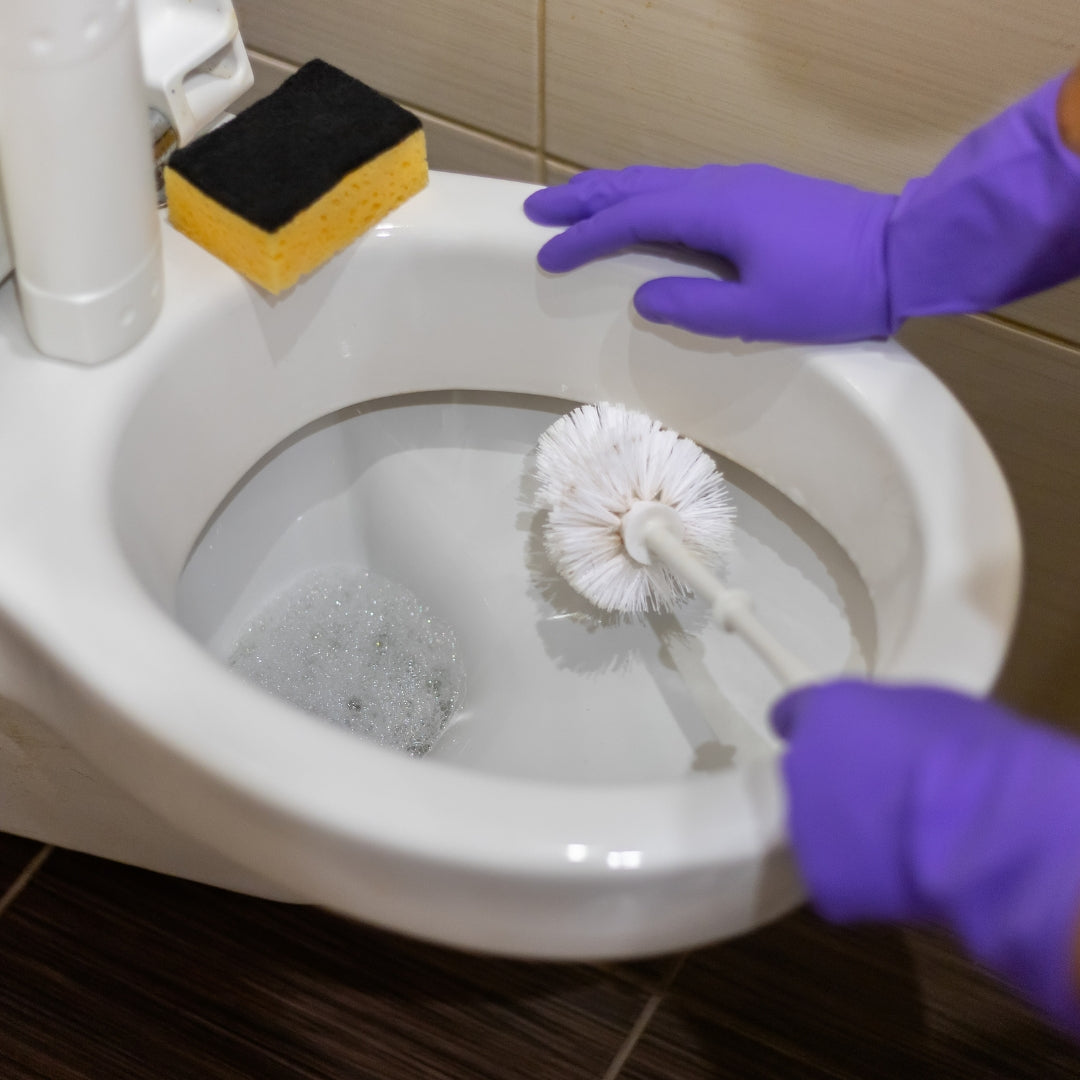 SynxTools 24-piece toilet brush set, sleek black design, durable bristles.