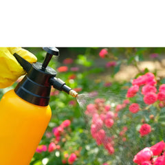 Green 1.5L Plant Spray Bottle with ergonomic handle and fine mist nozzle.