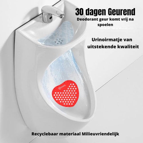 Rode urinoirmat geplaatst op een urinoir